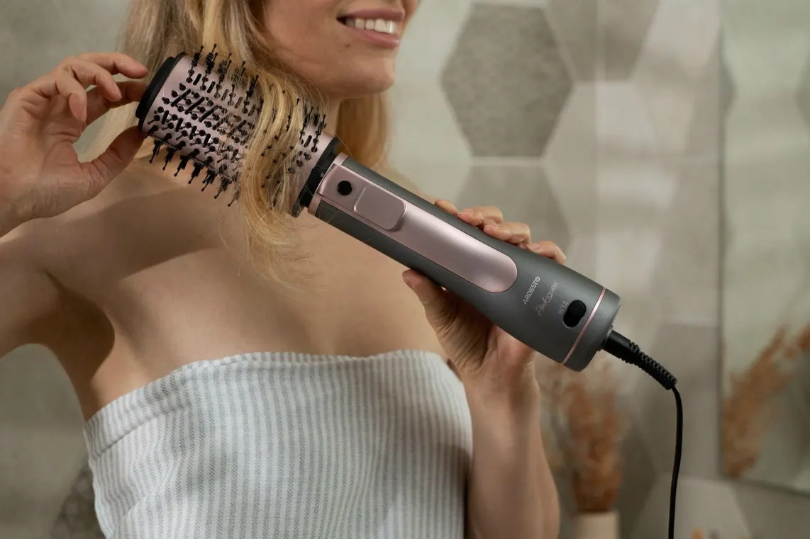 Ardesto Hair Dryer Brush Pink Touch, 1200W, 2 speeds, 2 temperature settings, ionization, LED-display, 4 attachments, gray+pink